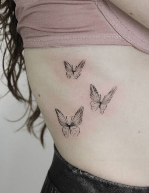 3 butterfly tattoo on arm