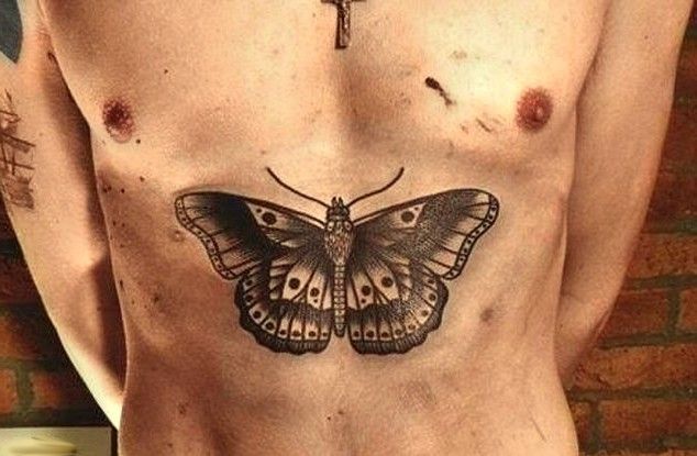 meaning of harry styles butterfly tattoo