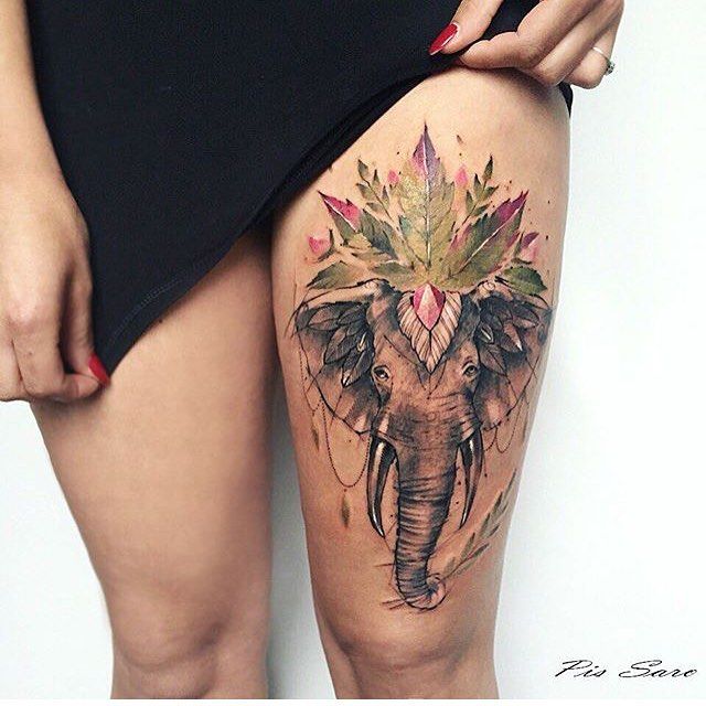 elephant head tattoo on thigh