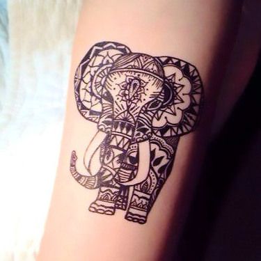 henna elephant tattoo on thigh