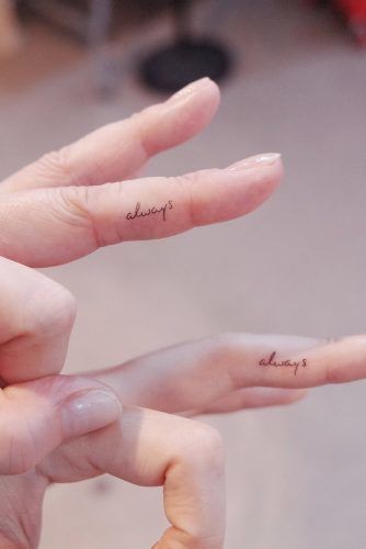 small finger tattoo words