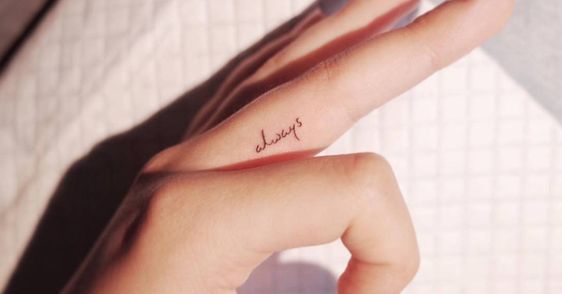 small finger tattoo words