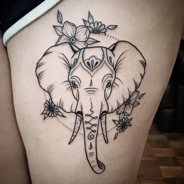 elephant tattoo on thigh